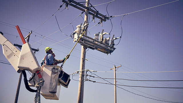Electric line workers. 
